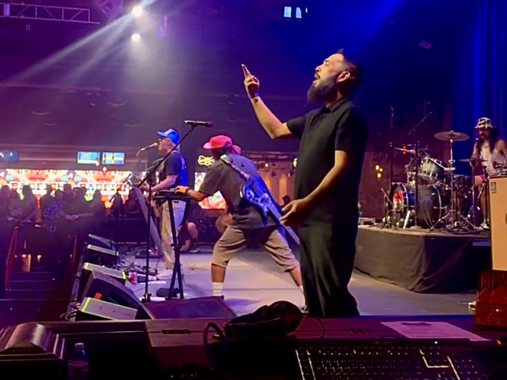 Dramatic red and blue stage lighting at a live performance
